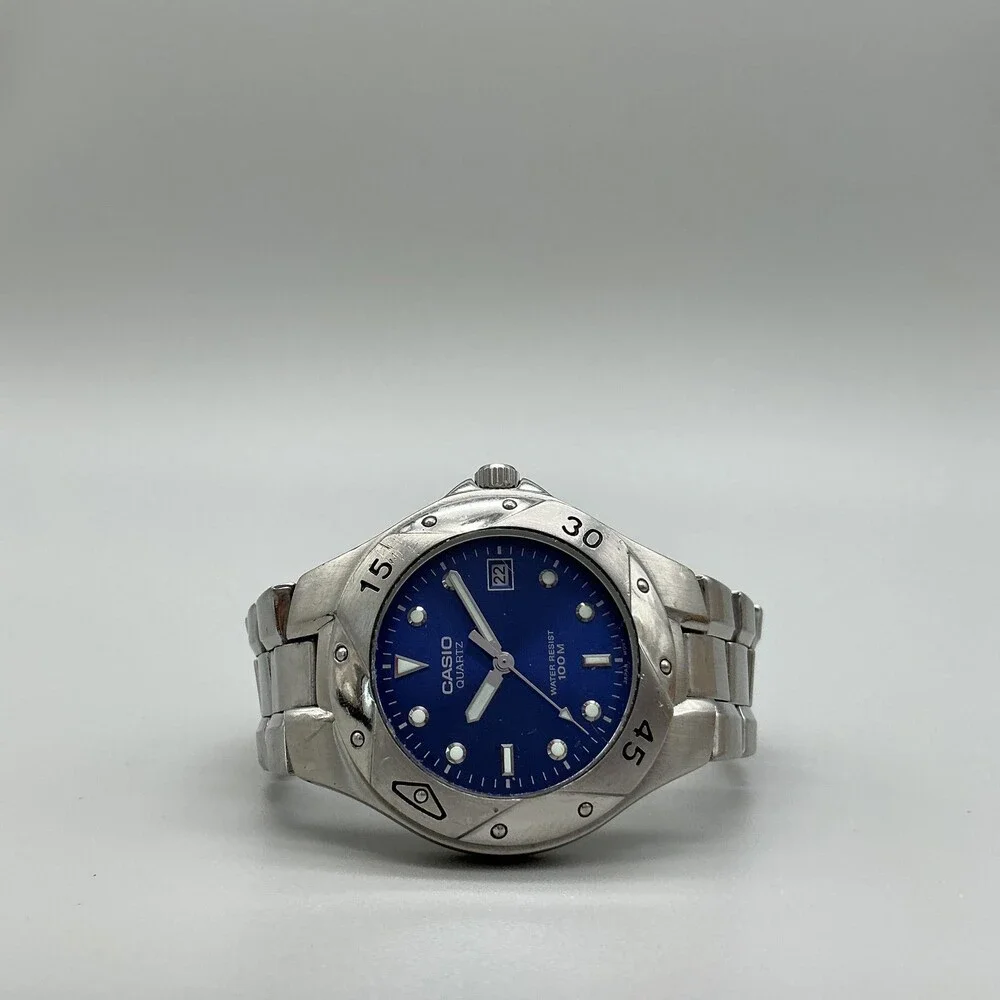 Casio 1346 MTD-1034 Mens Watch 37mm Blue Dial Silver Tone Date New Battery 6.5